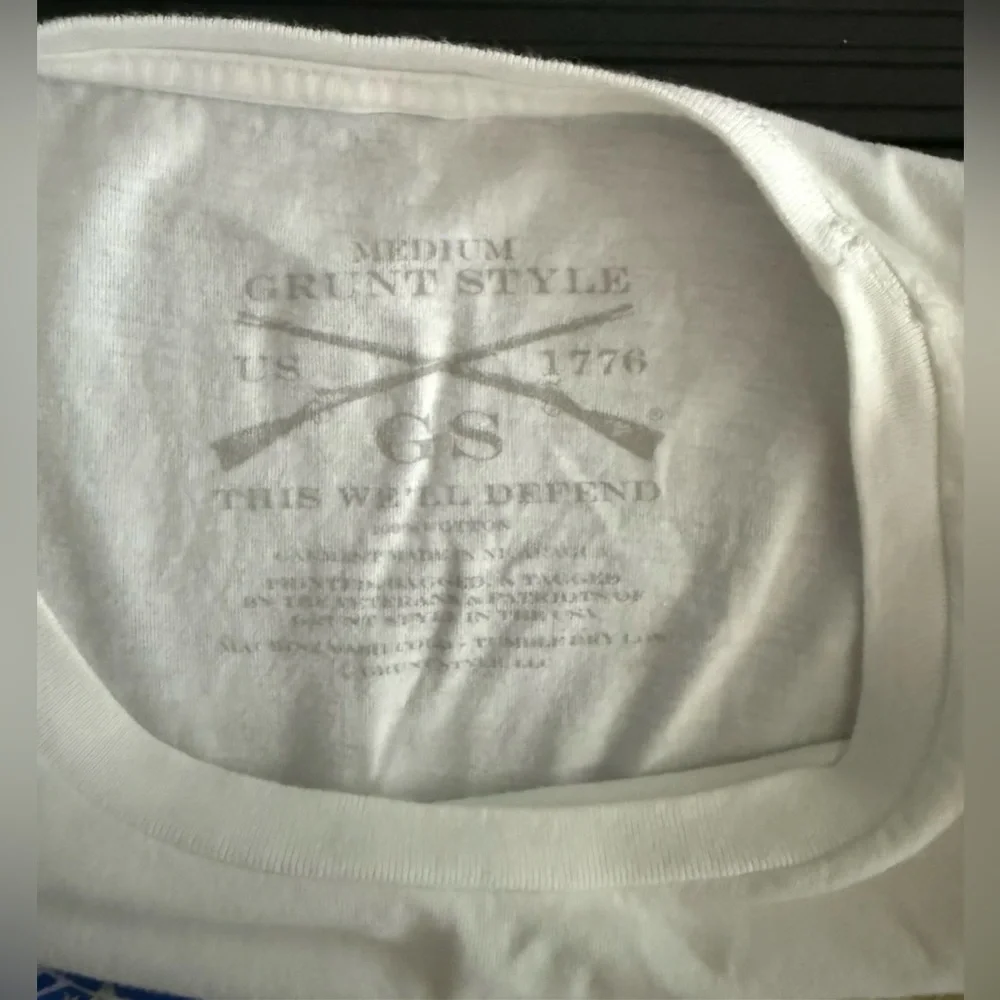 Women’s Grunt Style White Graphic Tee Size M


#0013 - Picture 5 of 5